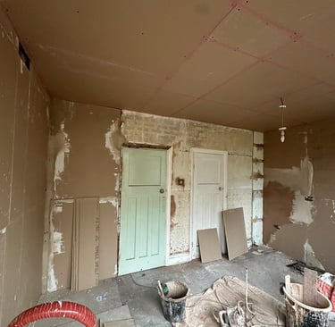 Plaster boarding in progress.
