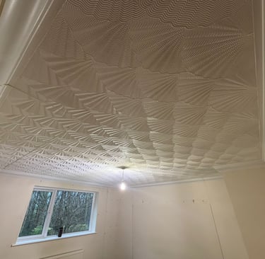 Our customer wanted a modern smooth surface to replace this outdated artexed ceiling.