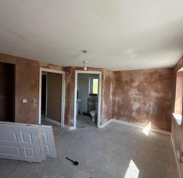 Professional plastering complete leaving smooth walls ready for decoration.