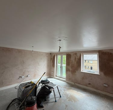 Walls plastered ready for decoration.