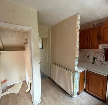 View of the kitchen as paper stripping began.