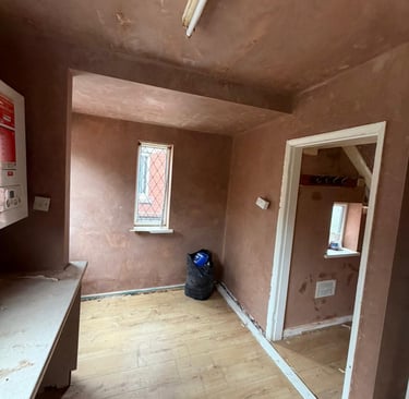 Smooth walls and ceiling ready for redecoration.