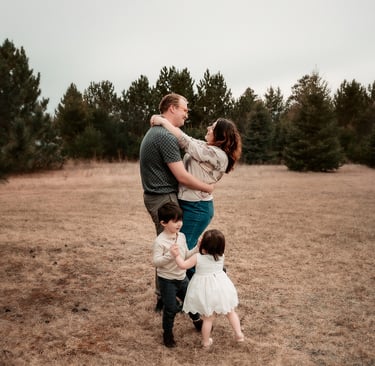 Duluth Family Photo in a field on a cloudy day