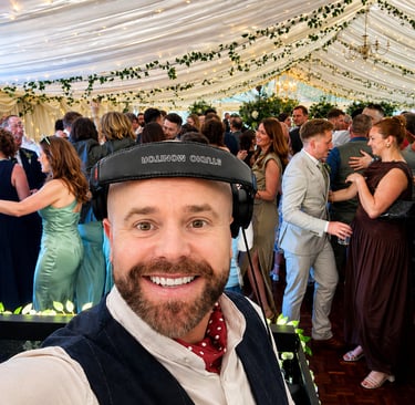 Worcestershire wedding DJ performing at Bordesley Park Alvechurch with full dancefloor and evening p