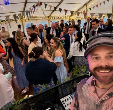 Marquee Wedding DJ and dancing crowd - Warwickshire