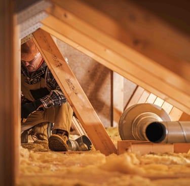 insulation worker in an attic