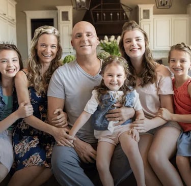 Dr. Patrick Flynn, founder and CEO of The wellness way with his family