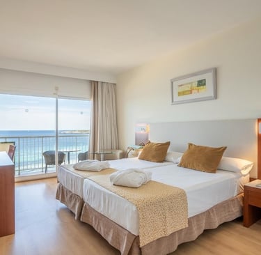 room with a large bed and a balcony reference cleaning and organization