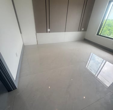a room with a large window and a large windo clean floor and window post construction jobw