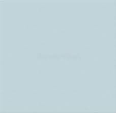 a man in a suit and tie is standing in front of a white background