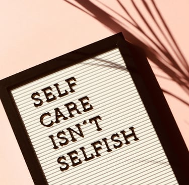 a self - care isn't selfish sign
