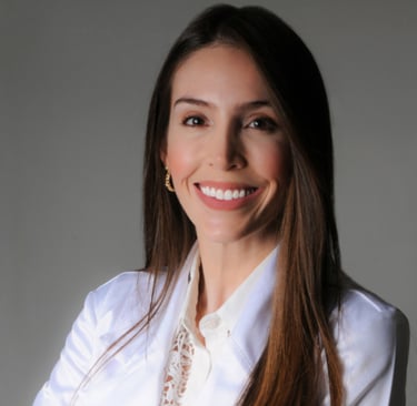 a woman with long hair and a white shirt