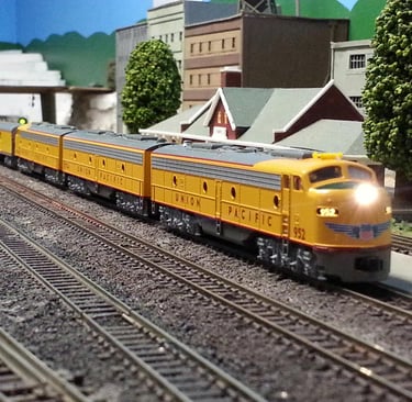 A UP passenger rolls through Tabar