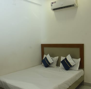 a nice and clean room at HOTEL JK Morbi