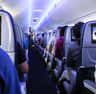 A photo of the aisle on a fully booked flight