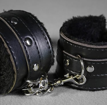 black lined cuffs for bdsm play