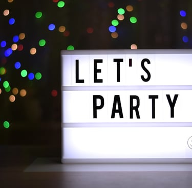 a light board that reads let's party