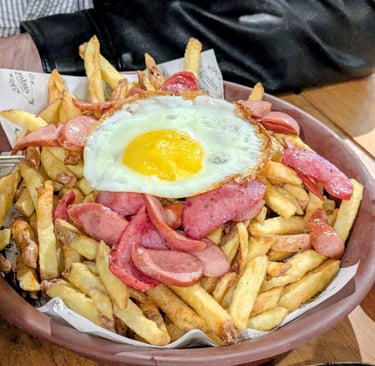 Salchipapa at Bardock in Urubamba