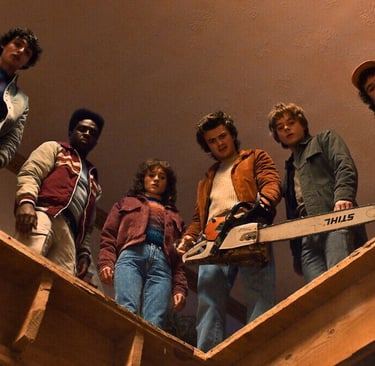 Stranger Things Season 5 characters standing around a dip looking down