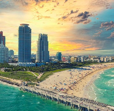 Begin where the skyline fades and the sea opens up.