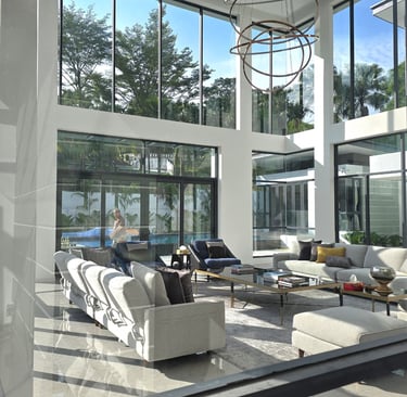Spacious high-ceiling living room in a custom-built luxury bungalow, featuring premium interior fini