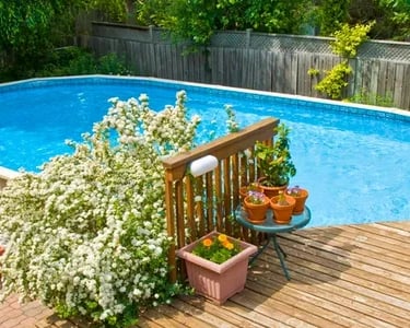 Custom deck built around an above ground pool