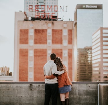 Happy couple looking over Birmingham, AL with Locksmith