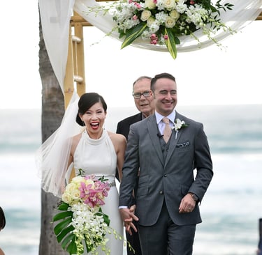 excited newlywed couple wedding at Scripps Seaside Forum