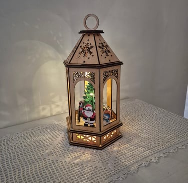 A uniquely handmade and painted Christmas lantern, A stunning table piece.