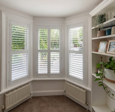 Bay window shutters installed in Richmond upon Thames period home