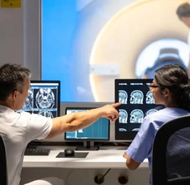 Radiologist analyzing brain MRI scans on digital screen