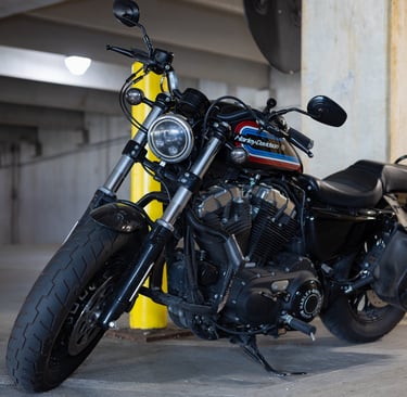 Harley Davison motorcycle parked in a parking garage
