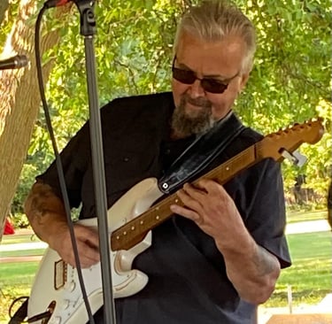 Tim O'Brien-Lead Guitar, Vocals