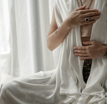 a woman sitting in ceremony