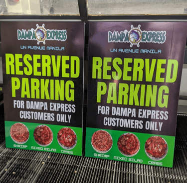Dampa Express reserved parking sintra board sign for customers.