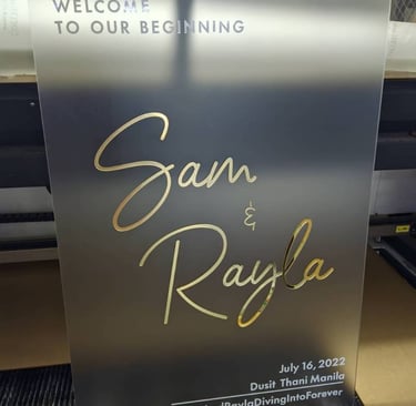 Elegant frosted acrylic wedding sign with gold script for Sam & Rayla, Dusit Thani Manila