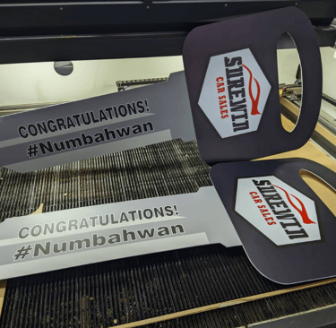 Celebratory car sales sintra board sticker with hashtag and logo.