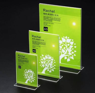 Set of three acrylic T-type sign holders in A5, A6, A7 sizes, displaying green information sheets.