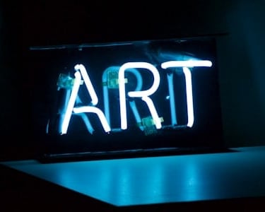Image of an ART neon sign represents the content of this page as artistic digital works are displaye