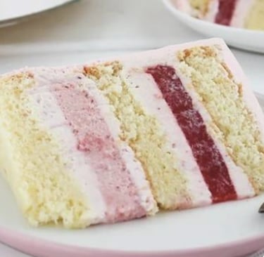 a slice of cake with a slice of cake on a plate