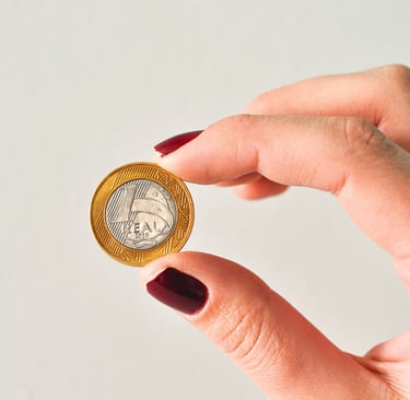 a person holding a coin with a coin