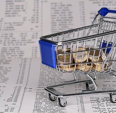 a shopping carton with coins in a shopping carton