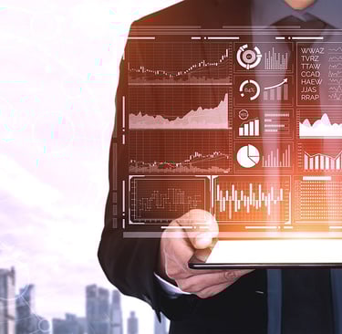 a man in a suit and tie is holding a tablet computer