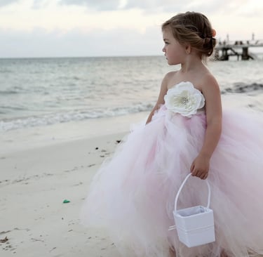flower girl on the beach in Lighthouse point wedding