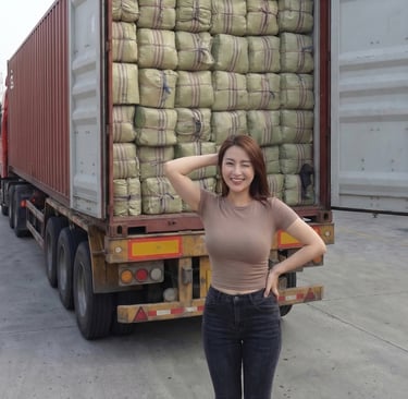 international export buyer standing behind a container of dried Gracilaria seaweed, Indonesia