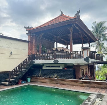 Strong antique teak columns supporting Joglo house structure ensuring long lasting durability and aesthetic value