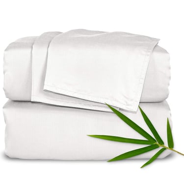 a bamboo leaf on a bed sheet set