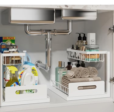 a kitchen sink with a shelf with a shelf with a basket underneath it