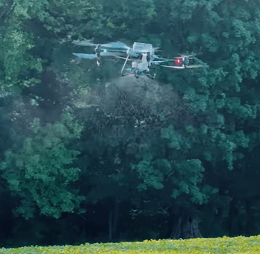 drone spreading fertilizer