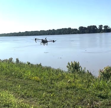 Spraying a river bank with a drone
